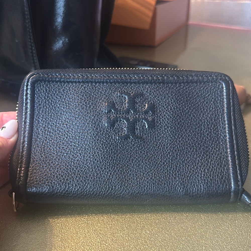 Tory Burch Wallet 7in long, 4in tall and 1in wide.
